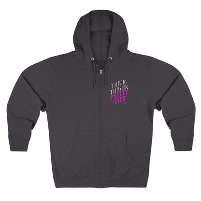 Dark gray hoodie with pink text on a white background