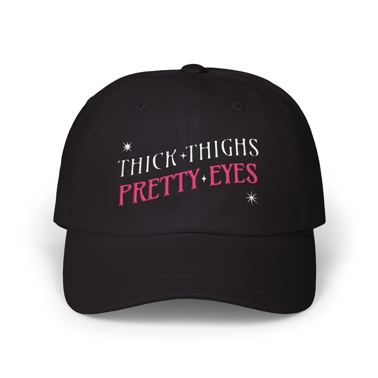 Black cap with 'THICK THIGHS PRETTY EYES' text on a white background