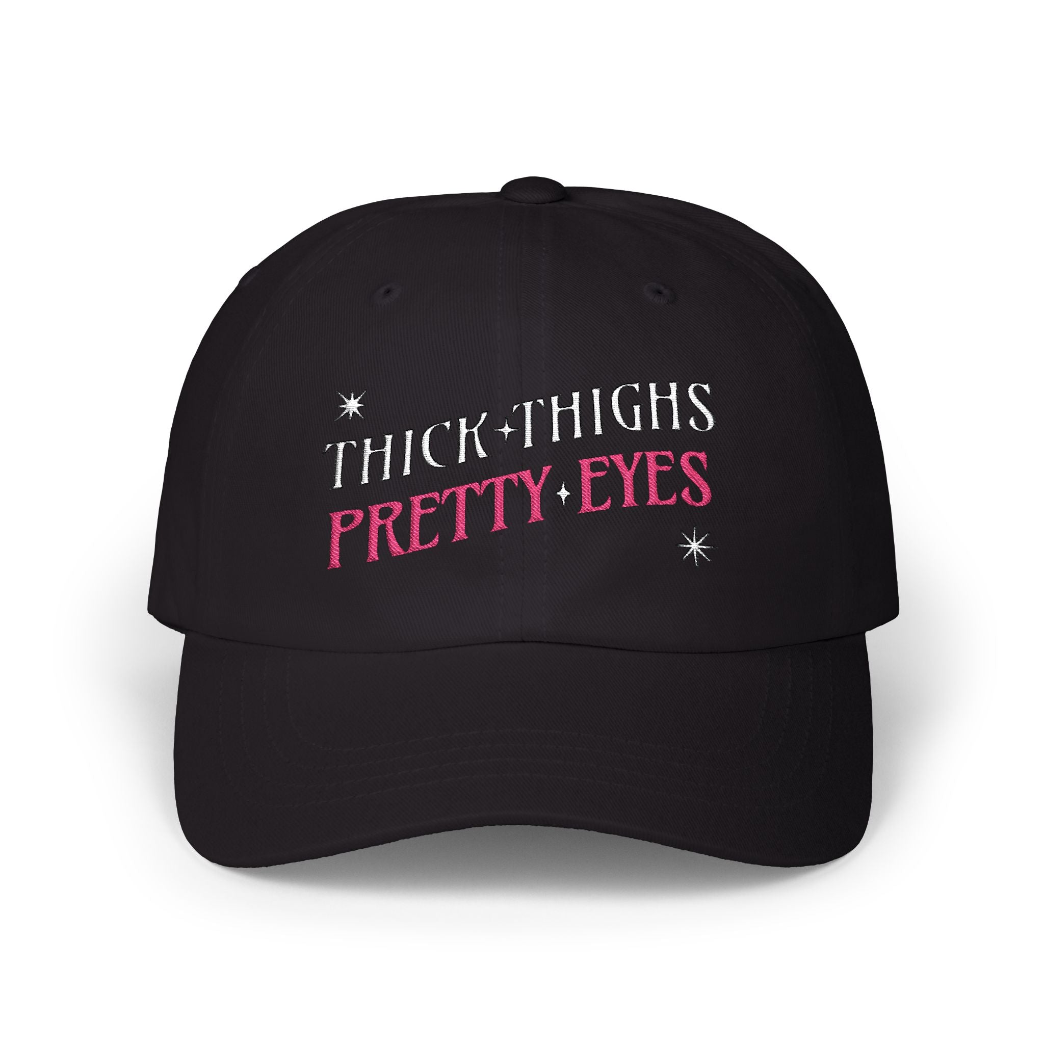 Black cap with &#39;THICK THIGHS PRETTY EYES&#39; text on a white background