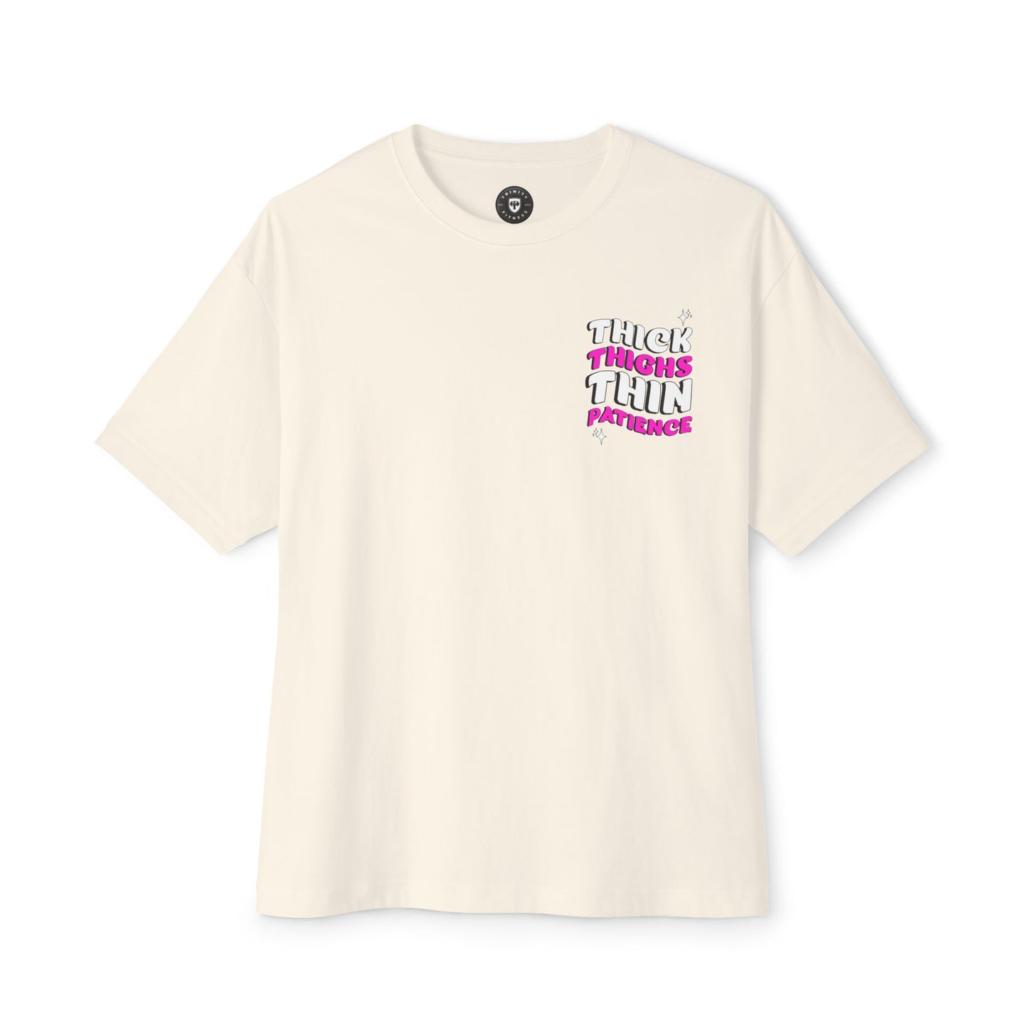 Beige t-shirt with pink and black text on a white background