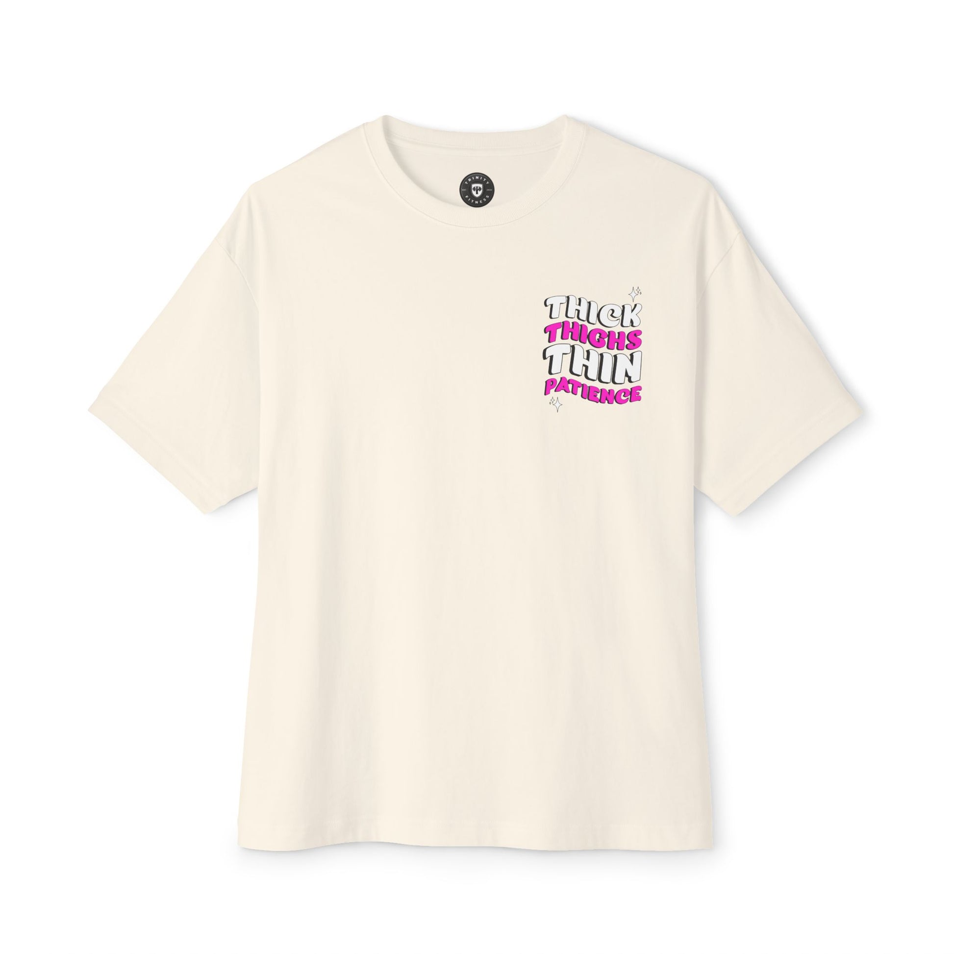 Beige t-shirt with pink and black text on a white background